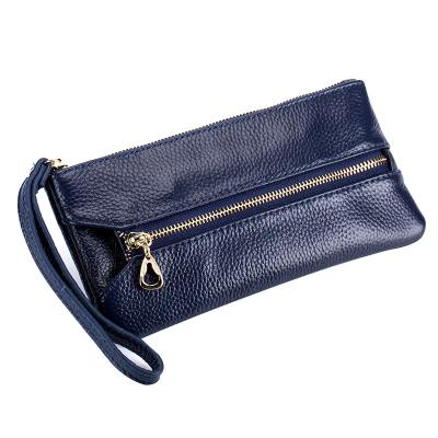 China Normcore/Minimalist Women Small Zipper Leather Purse Coin Wallet Change Pocket Card Holder Can Hold 5.5inch Cell Phone With Wristband Clutch Bag for sale