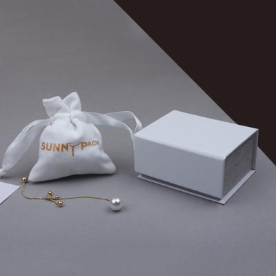 China Small Fashion Stylish Recyclable Lid Magnet Minimalist Paper No Logo Pull Out Gift Box Packaging With Insert String Velvet Pouch Custom Bag For Jewelry for sale