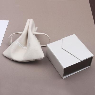 China Elegant Fashion Recyclable Beige Jewelry Bag Customize Cardboard Magnetic Jewelry Packaging Boxes With Insert Pocket And Logo for sale