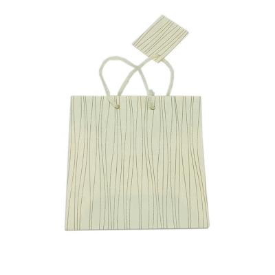 China Free Sample Wholesale Custom High Quality Yellow Vertical Fringe Paper Jewelry Bag Durable for sale