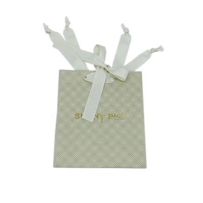 China High End Jewelry Yellow Paper Bag Durable Free Sample New Custom Design With Ribbon for sale