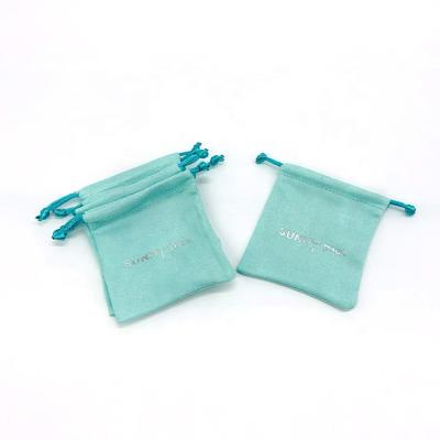 China Free Sample Durable Unique Green Suede Drawstring Custom Jewelry Storage Pouch With Silk Logo for sale