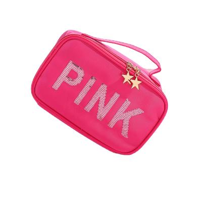 China Fashion professional entice girls easy-to-carry makeup bag waterproof nylon glitter makeup bag cosmetic bag for sale