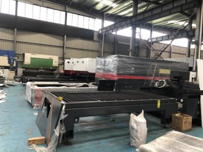 China CNC Fiber Exchange Table Laser Cutting Machine 6kw Cut 60mm with Whole Cover for sale