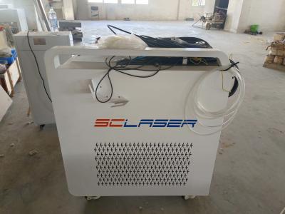 China Sistema de refrigeración Máquina de limpieza por láser enfriada por aire Eliminadora de óxido para la industria Eliminadora de óxido de haces de impulso en venta