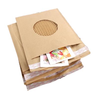 China Shock Resistance Recyclable Natural Paper Padded Mailer Bag Honeycomb Paper Cushion Custom Printing Mailer for sale