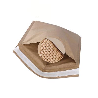 China Shock Resistance New Arrivals Packaging Biodegradable Eco Courier Honeycomb Kraft Paper Bag for sale