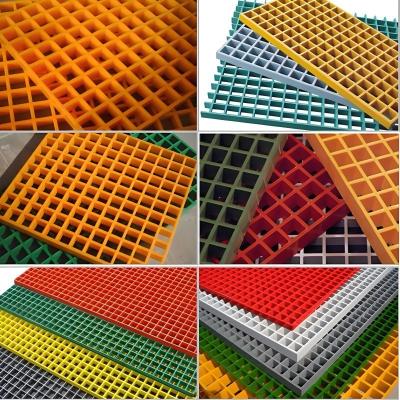 China Fiberglass Reinforced Plastic Grating Composite FRP Grating Pultruded Trench Cover Plate 38*38*38 for sale