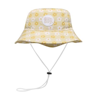 China Verstellbarer Kinnband Surf Bucket Hut mit schnell trocknen Stoff und gedruckten Blumen-Design zu verkaufen