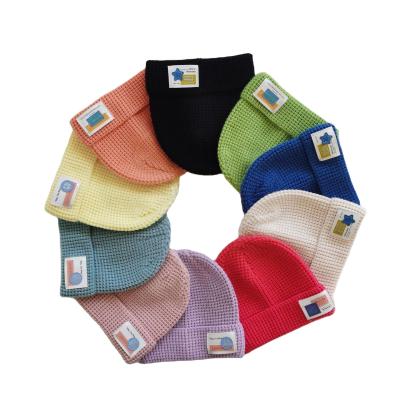 China Acrylic Cashmere Wool Waffle Beanie in Winter with Custom Knitted Patch and RPET Label for sale