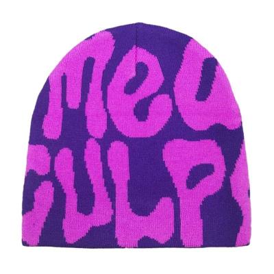 China Custom Color ODM Designs 100% Cotton Cuffless Beanie Hats featuring Jacquard Logo for sale