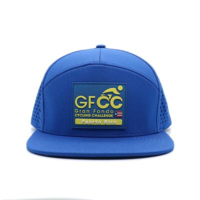 China Flat Brim Baseball Hat With 7-Panel Embossed Rubber PVC Logo Waterproof Laser Cut Hole for sale