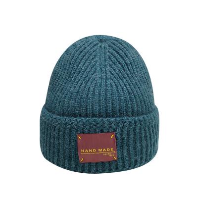 China Custom Woven Label RPET Acrylic Wool Material Unisex Cuffed Beanie Hat for Traveling for sale