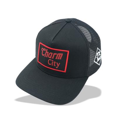 China Custom Black Embroidered Cotton Mens Mesh Trucker Hats for sale