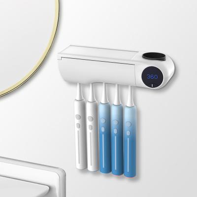 China 2021 ABS Toothbrush Sanitizer Sterilization Holder UV-C Led Toothbrush Sterilizer With Fan for sale