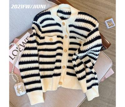 China Anti-Wrinkle Striped Knitted Cardigan Women's Contrast Black And White Sweater Coat for sale