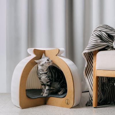 China New Breathable Accordion Folding Kraft Cardboard Cat Pet House for sale