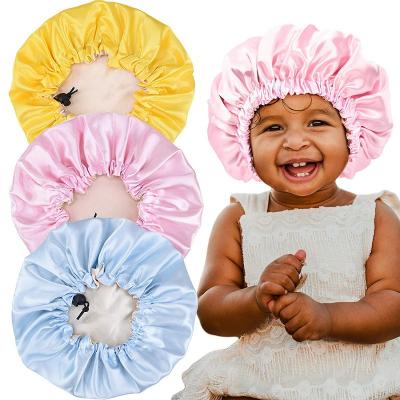 China Hot Selling Newborn Baby Kids Head Satin Hair Sleep Hats For Sleeping Custom Logo Kids Adjustable Silk Hood for sale