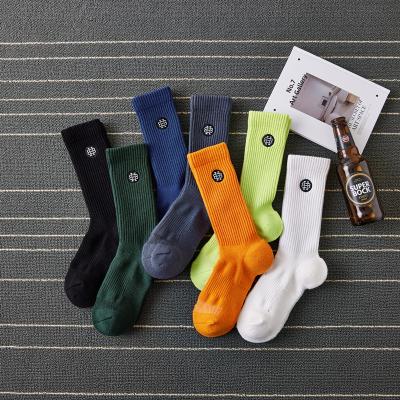 China Autumn And Winter Men Long Breathable Tube Solid Sports Knock Out Breathable Cotton Socks Embroidery for sale