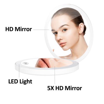 China Double 1X and 5X Magnification Lighted Makeup Mirror LED Side Mirror Folding Makeup Mirror Rechargeable for sale