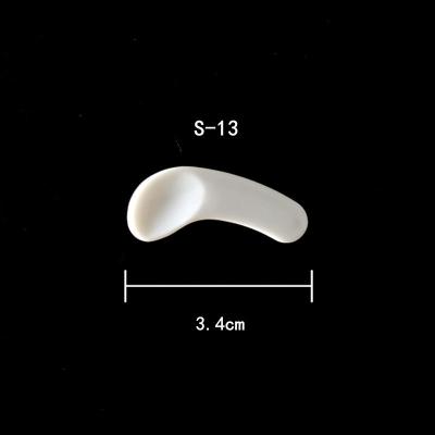 China Small Eye Mini Cosmetic Mask Spoon Wholesale Custom Silicon Plastic Face Applicator Facial Cream Mask Spatula for sale