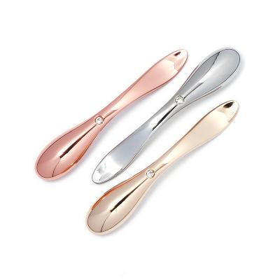 China Eye Cream Applicator Anti Wrinkle Cosmetic Spatulas Eye Roller Massager Stick Facial Massager Mask Alloy Metal Skin Care Spoon Tools Golden for sale