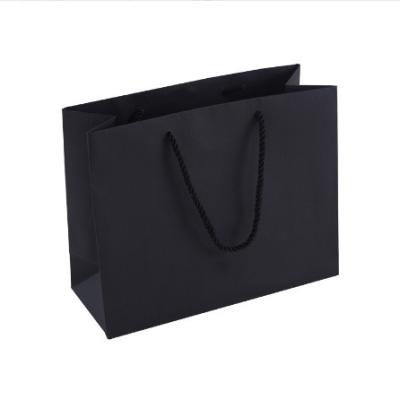 China Disposable Quality Assurance Food Packing Kraft Paper Bag Wholesale With Handle Food Packing Bag for sale