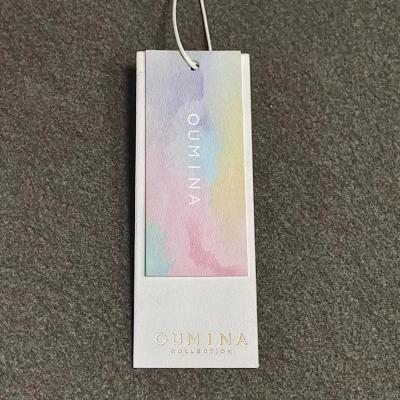 China Heat Sensitive Custom Luxury Clothes Label string paper hangtags for sale