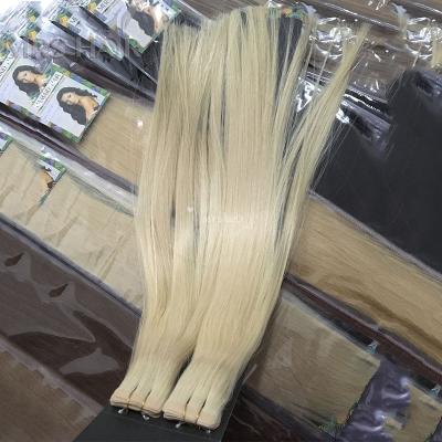 China Xuchang Silky Straight Factory for 100% European Remy Human Double Drawn Tape Hair Extensions Higheset Virgin Good Quality Cuticle Hair for sale