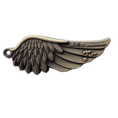 China China Manufacturer Directly Electroplated Bronze Ancient Angel Wing Badge, And Logo School Badge Can Be Customized for sale