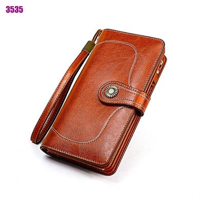 China High Quality Embossed Pattern Clutch Leather Ladies RFID Purse Long Wallets For Women Fashionable for sale