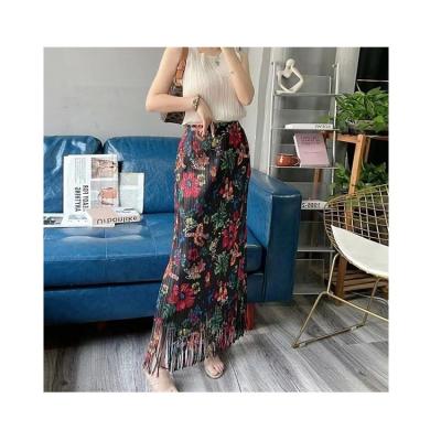 China Customized Popular Anti-Static Holiday Casual Beach Skirts Women Elegant Tassels Skirt High Waist Free Size Pleated Skirt for sale