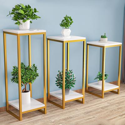 China Modern Nordic Minimalist Balcony Metal 2 Layers Flower Rack Living Room Flower Display Rack Gold Stand for sale