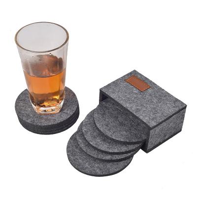 China Simple Design Sustainable Round Drink Absorbent Felt Coasters With Stand for sale