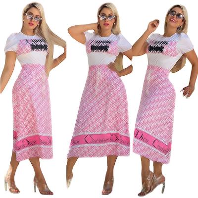 China Breathable 2023 summer new printed short-sleeved long skirt two-piece set Casual luxury clothes for women for sale