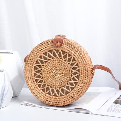 China New Style High Quality Cavity Travel Handwoven Straw Crossbody Handbags Round Hand Rattan Shoulder Bag for sale