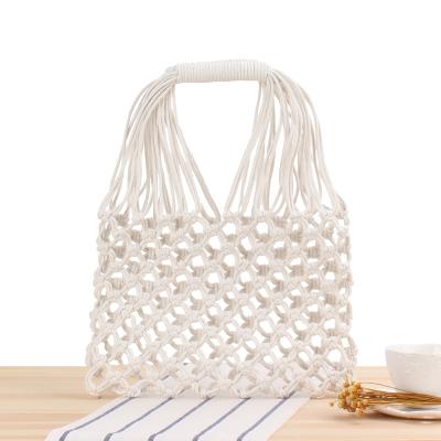 China Retro Natural Beach Woven Mesh Hollow Tote Shoulder Bag Straw Rattan Beach Handbag Summer Fashion for sale