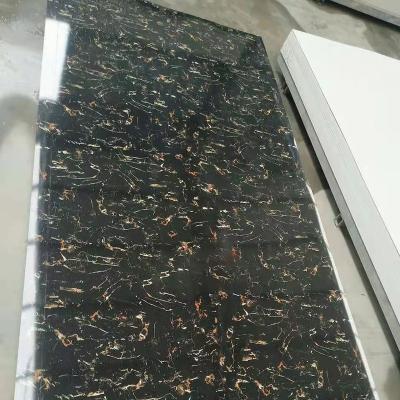 China Modern Wholesale Glossy Imitation PVC SPC Marble Sheet For Wall Panel for sale