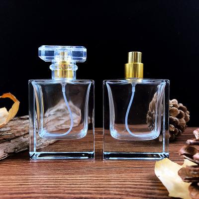 China Spray Glass Pump Bottles Personal Care Square Perfume Brand 50ml Empty Perfume Bottles for sale