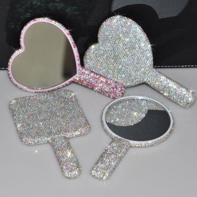 China Personalized Diamond Heart Shape Portable Bling Princess Makeup Mirror Hand Mirror Full Rhinestones Decoration for sale