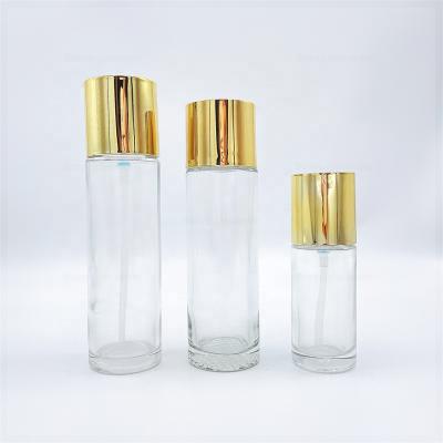 China Clear 50ml 100ml 150ml Essential Oil Round Glass Bottle Packaging Glass Lotion Pump Bottles For Liquid for sale