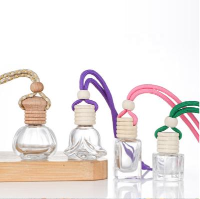 China 5ml 10ml Essential Oil Car Air Freshener Empty Hanging Hanging Car Perfume Bottle With Wooden Cap for sale