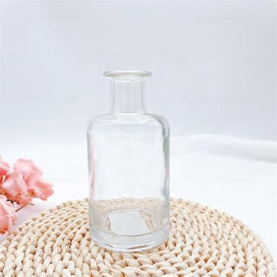 China Reed Glass Aroma Oil Bottle With Sticks Tubular Air Freshener Diffuser Glass Bottle 200ml for sale