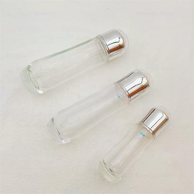 China Recyclable Skin Care Essential Oil Skin Care Creams Packaging 40ml 100ml Skin Care Pump Serum Glass Bottle for sale