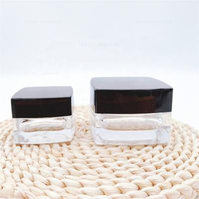 China Hot Sale Cosmetic Face Cream Container 50ml Square Glass Face Cream Jar With Lid for sale