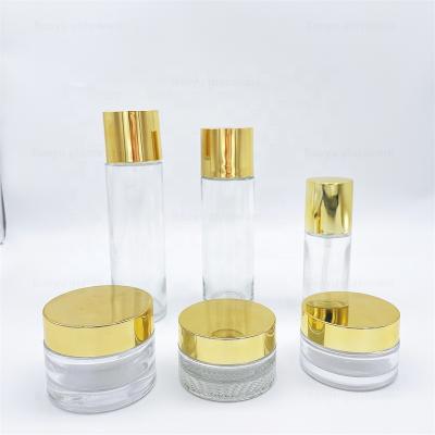 China 30ml 50ml face cream cosmetic packaging jar skin care containers cream glass jars with gold lid for sale