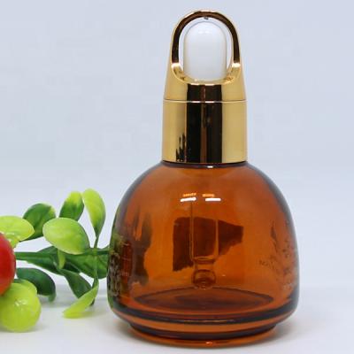 China Custom Sensitive Short Essential Oil Shoulder Cylinder Bottle 50ML Glass Bottle With Dropper Cap for sale