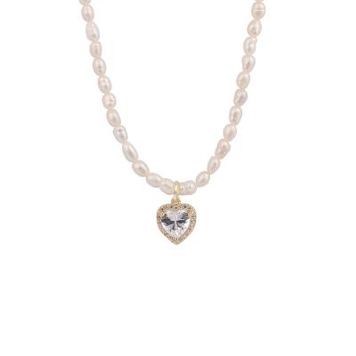 China CLASSIC Simple Temperament Female Natural Freshwater Pearl Diamond Love Pendant Clavicle Chain Necklace for sale