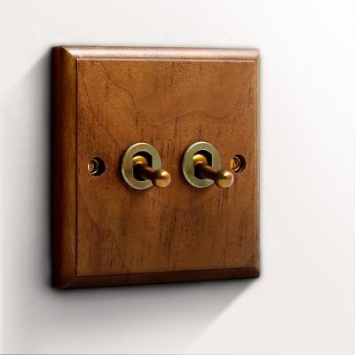 China Real Wooden Wall Switch 2gang Wall Knob Toogle Panel Lamp Light Switch Socket Wooden Panels for sale