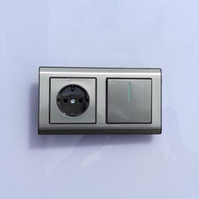 China Stainless Steel Frame OEM EU Standard Stainless Steel Frame Designs Electric Wall Socket And Switch for sale